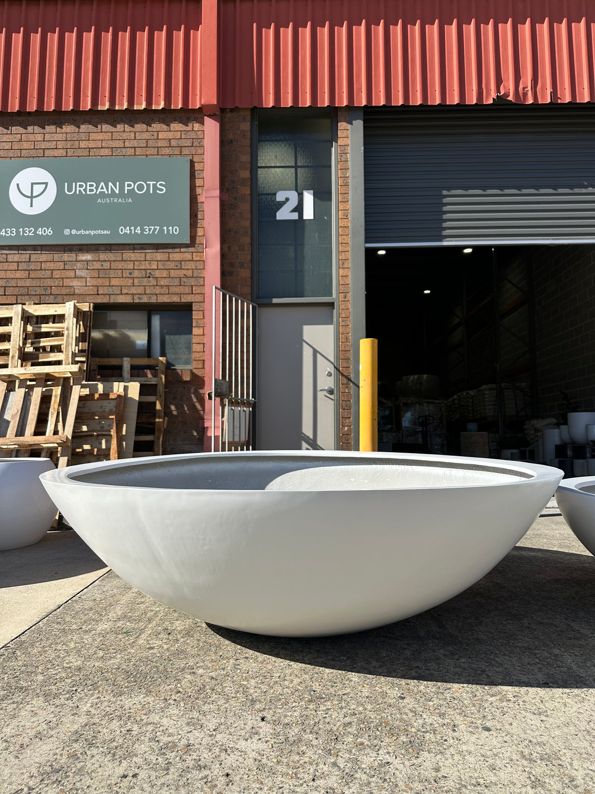 Partner with our expert team for premium commercial planters hover